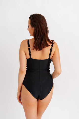 Jednodílné tvarující plavky s průsvitnými vsadkami na bocích, černé