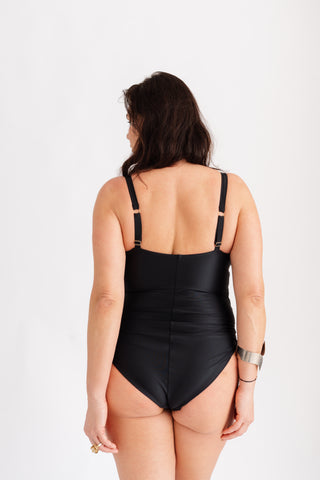 Jednodílné tvarující plavky s průsvitnými vsadkami na bocích, černé