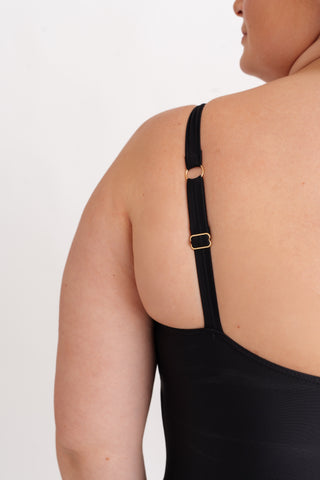 Jednodílné tvarující plavky s průsvitnými vsadkami na bocích, černé