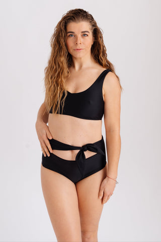 Spodní díl s vysokým pasem a mašlí v pase, v černé