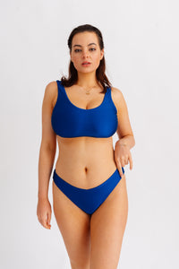 Spodní díl plavek s nízkým pasem a vykrojením do V, modrý