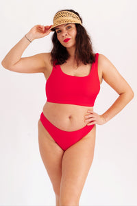 Spodní díl plavek klasického střihu v žebrovaném provedení, růžový