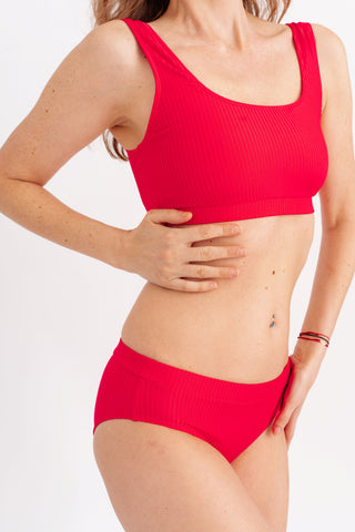 Spodní díl plavek klasického střihu v žebrovaném provedení, růžový