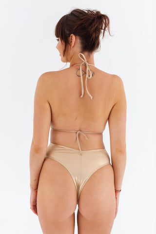 Jednodílné plavky monokiny s prostřihy a sponami, zlaté